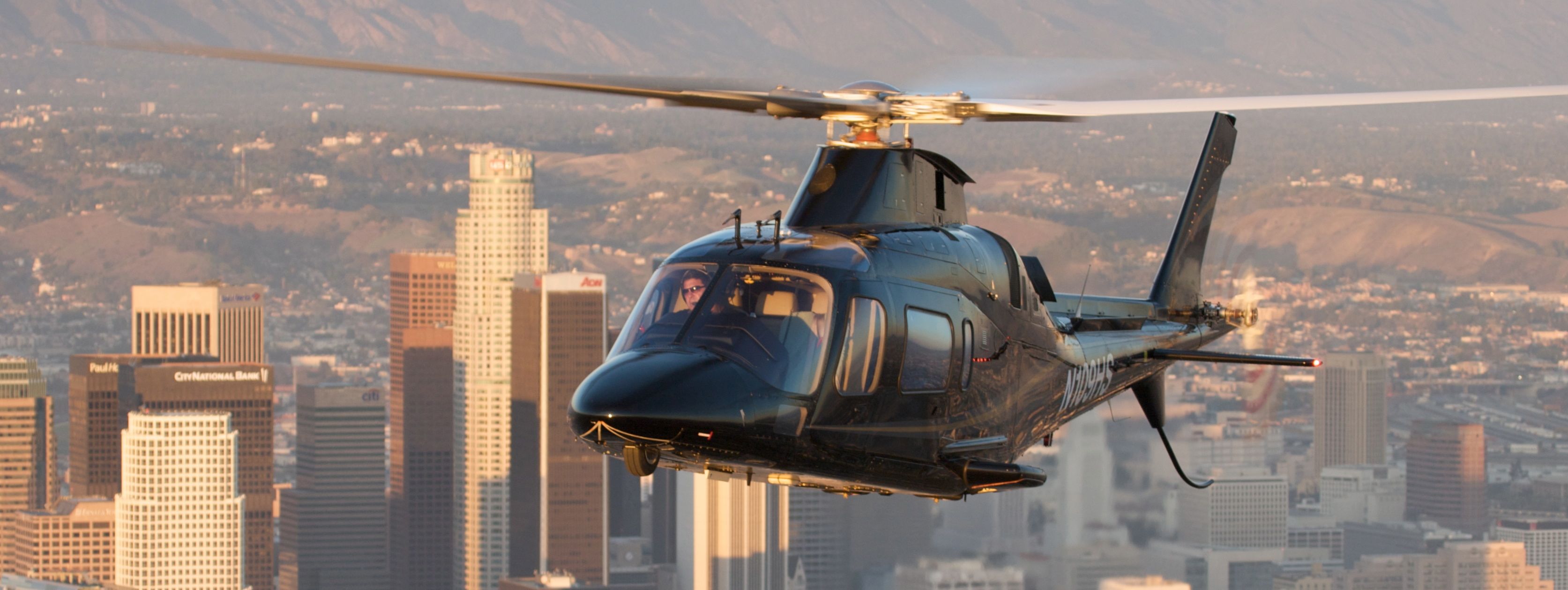 Lance Strumpf pilot Agusta 109E Power over downtown Los Angeles